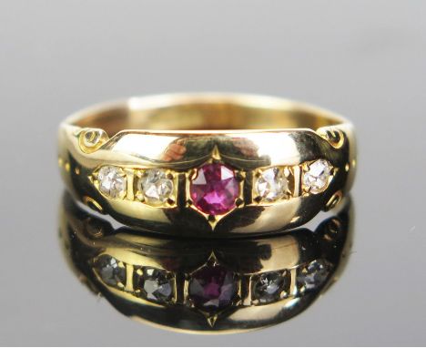 A Victorian 18ct Gold, Ruby and Diamond and Old Cut Diamond Gypsy Ring, 3mm central stone, size M.25, 2.79g 