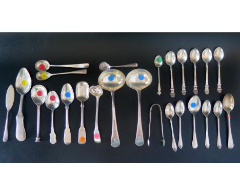 A collection of assorted silver flatwares, various makers and dates, includes sauce ladle, sifting spoon, tea and coffee spoo