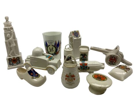 Quantity of WWI crested ware including Memorial Statue, Norwich, armoured car, Peace mug, Zeppelin, 'Victory of Justice' fiel