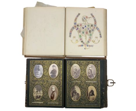Victorian stamped leather photograph album and contents of portrait photographs and with metal clasp and 'Armorial Album' pub