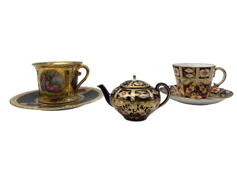 Vienna style cabinet cup and saucer decorated with panels of classical scenes with floral gilt detailing together with Royal 