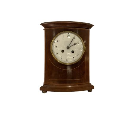 French - Edwardian 8-day mahogany mantle clock with inlay, white enamel dial with Arabic numerals and steel spade hands, stri