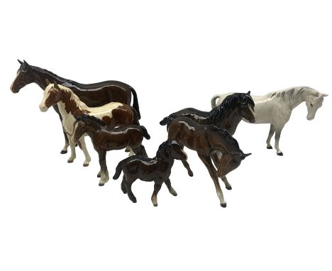 Collection of Beswick horses including Skewbald Pinto 1373, first version, Shetland pony 1033 and foal 1034, Racehorse H701 s