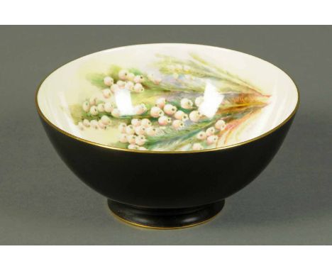 A Royal Worcester bowl, handpainted with foxgloves, etc., by W. Hale, puce mark to base.  Diameter 7 ins.  CONDITION REPORT: 