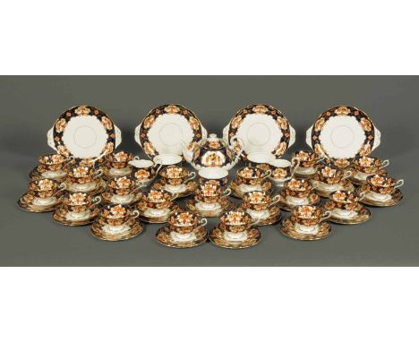 A Royal Albert Heirloom pattern tea service, comprising twenty cups, twenty one saucers, four sandwich plates, twenty one pla