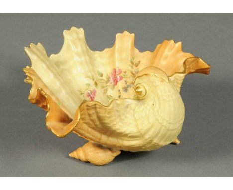 A Royal Worcester shell shaped dish, green mark to base.  Length 7.5 ins.  CONDITION REPORT: The dish is in generally good co