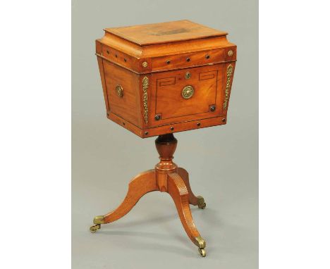 A Regency mahogany teapoy, converted to a worktable, with caddy top, ebony stringing, brass carrying handle to either side, t