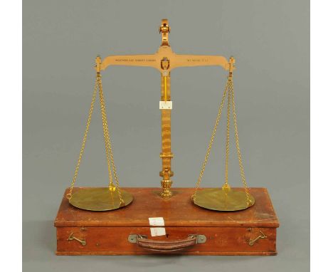 A Westmorland County Council 7lb beam scale, cased.