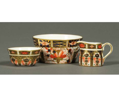 A Royal Crown Derby miniature sugar basin and cream jug and a further basin.  Cream jug height 1.5 ins. 