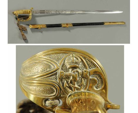 A Royal Navy Reserve sword, London made, brass guard, wire bound grip and etched blade, with leather and brass scabbard.  Bla