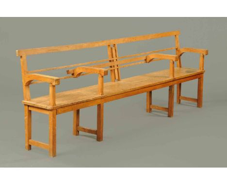 A 19th century oak hall bench, raised on legs of square section.  Width 96 ins.  CONDITION REPORT: This bench is all intact w
