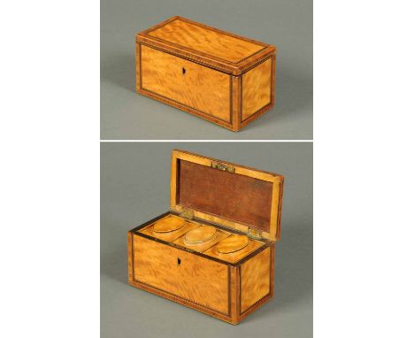 A George III satinwood tea caddy, with crossbanding and three interior lift out lidded caddies.  Width 8 ins (see illustratio