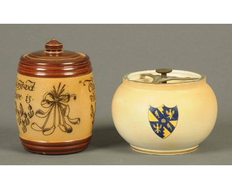 A Carltonware tobacco jar, with crest, and a Doulton Lambeth lidded tobacco jar.