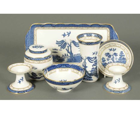 A Royal Doulton Booths "Old Willow" dressing table set, comprising tray, pin dish, vase, pair of candlesticks, bowl and ginge