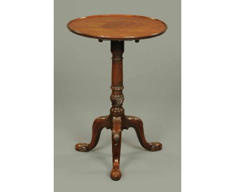 A George III mahogany snap top tripod table, the well figured top with moulded edge and snap action supported by a turned col