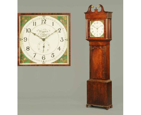 An early 19th century oak and mahogany crossbanded longcase clock, with swans neck pediment above a square dial marked "Wigga