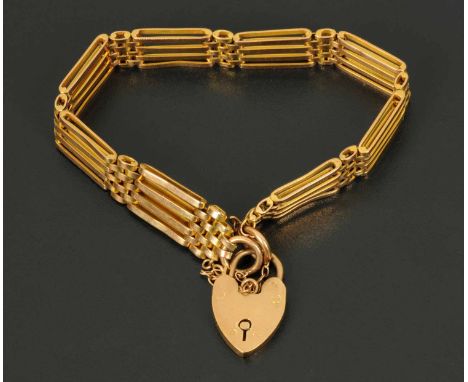 A 9 ct gold gate bracelet, with padlock and safety chain, 17.7 grams. 