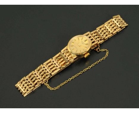 A ladies 9 ct gold cased Rotary wristwatch, with 9 ct gold gate bracelet, quartz, 16.7 grams gross (see illustration).
  