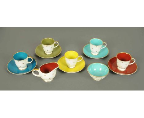 A Susie Cooper coffee service, comprising four cups, five saucers, sugar basin and milk jug.  