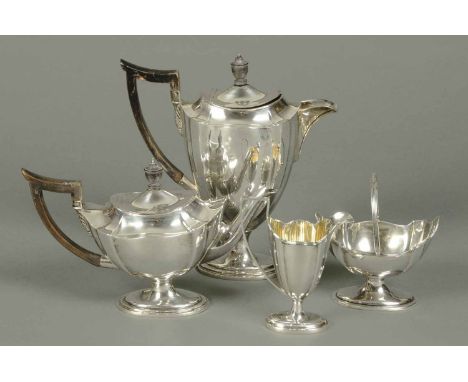 An Adam style four piece silver tea service, London 1897/8, 1202 grams gross (see illustration).
   CONDITION REPORT: The hot
