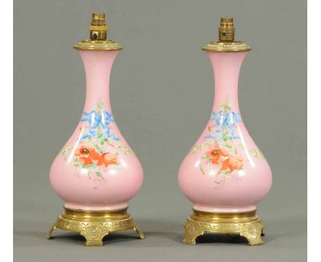 A pair of Continental porcelain vases, converted to table lamps, each with metal base.  Height including light fitting 17. 5 