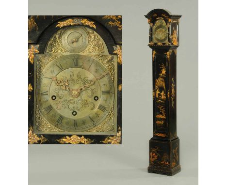 A Chinoiserie lacquered three-train grandmother clock.  Height 68 ins.  CONDITION REPORT: The clock case is in generally very