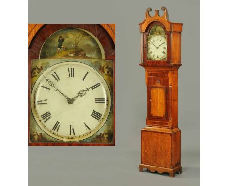 An early 19th century oak and mahogany crossbanded longcase clock, with swans neck pediment above the arched painted dial wit