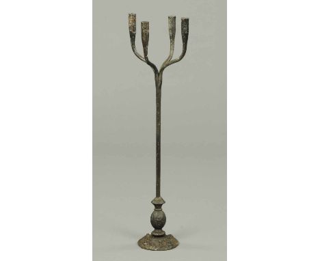 A four branch rush light holder, iron, with moulded base.  Height 32 ins. 