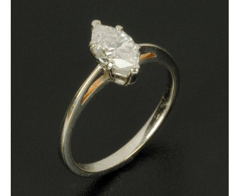 A 14 ct white gold diamond ring, marquise cut, size K (see illustration).
 