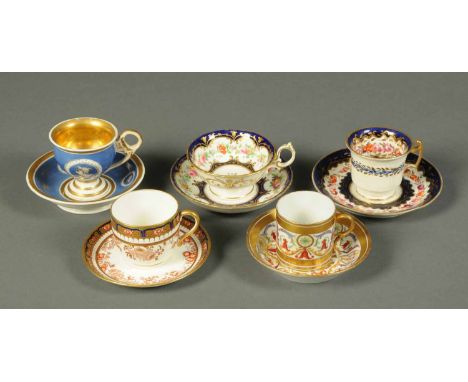 Five cabinet cups and saucers, French, Wedgwood, Coalport and two others.   CONDITION REPORT: The lighter blue and floral tea