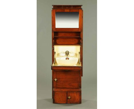 Railway Interest - A Victorian mahogany combined washstand, mirror and cupboard, the folding front opening to reveal a ware w