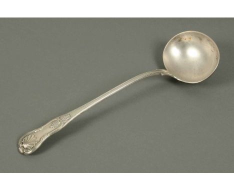 A Victorian Exeter silver soup ladle, double struck Kings pattern, 1863, 350 grams.  Length 14.5 ins (see illustration).
  CO