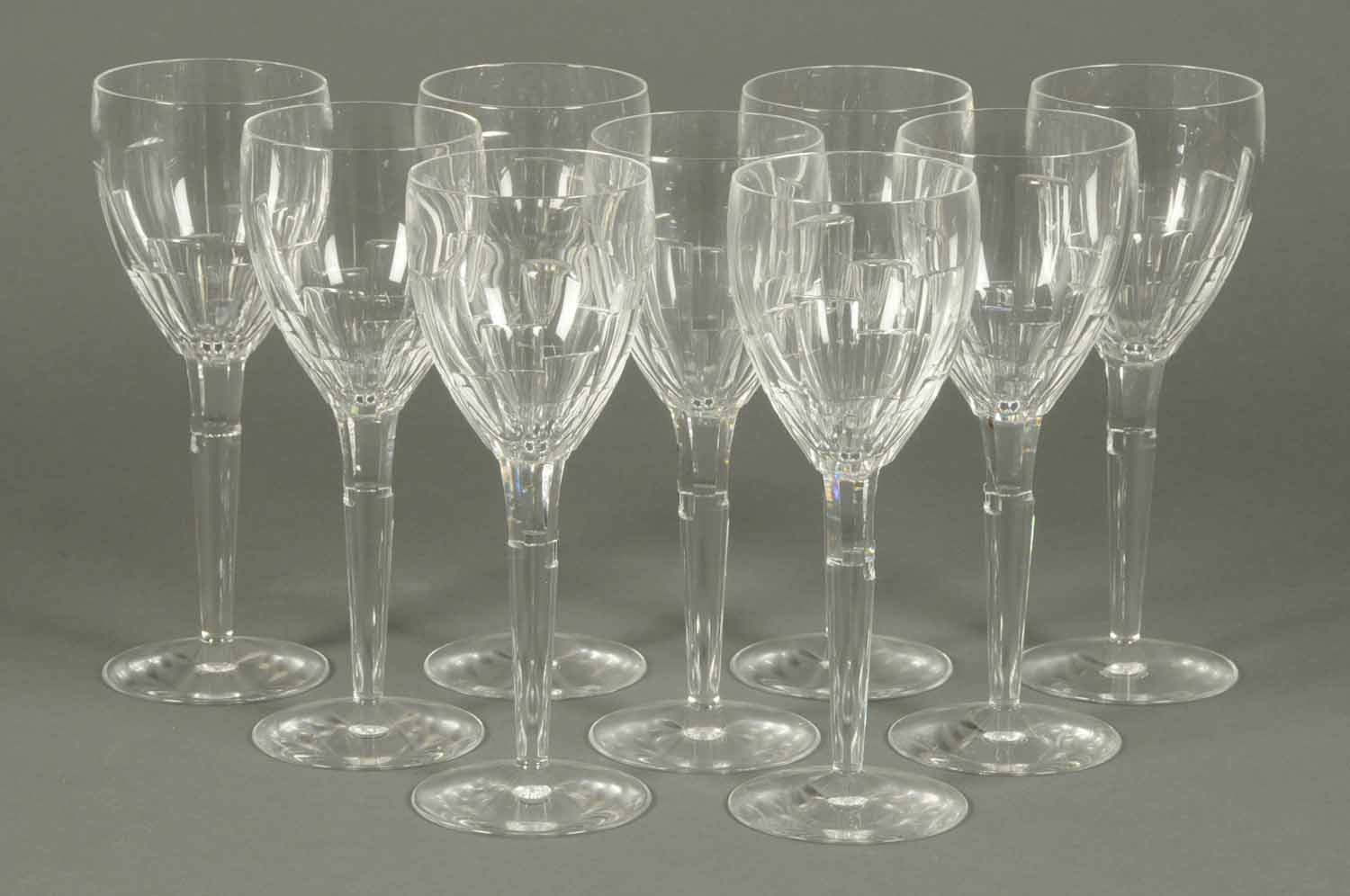 A set of nine Jasper Conran Stuart Crystal red wine glasses, each with