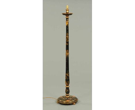 A Chinoiserie standard lamp, ebonised and heightened with gilding.   CONDITION REPORT: Height to top of wooden section exclud