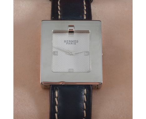 Hermes - A Lady's quartz wrist watch, rectangular white dial with a herringbone engine turned pattern and quarter batons in a