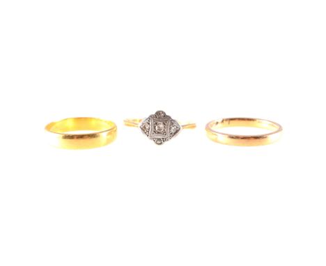 Three gold rings, a plain polished 22 carat gold wedding band, 3.8mm wide, approximate weight 2.9gms, ring size L, a plain po
