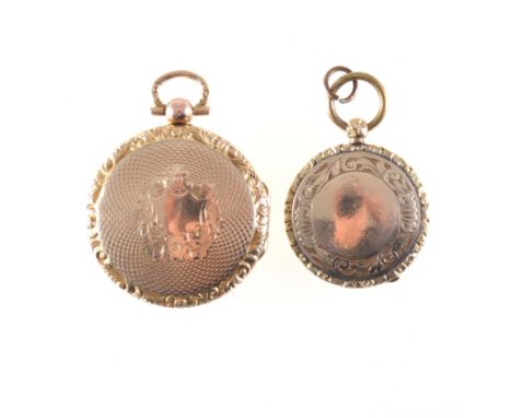 Two Victorian style gold coloured lockets, engine turned and engraved. (2)