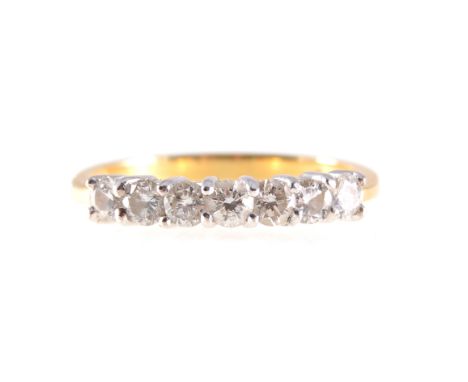 A diamond half eternity ring, seven brilliant cut stones claw set in an 18 carat yellow and white gold half eternity mount, 2