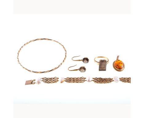 A collection of gold jewellery, a yellow metal three strand belcher link bracelet spaced by six blister pearls, a smoky quart