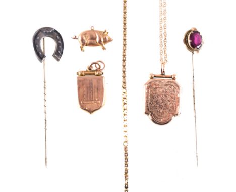 A collection of Edwardian and later jewellery, to include two 9ct back and front shield shaped lockets, a 9 carat rose gold h