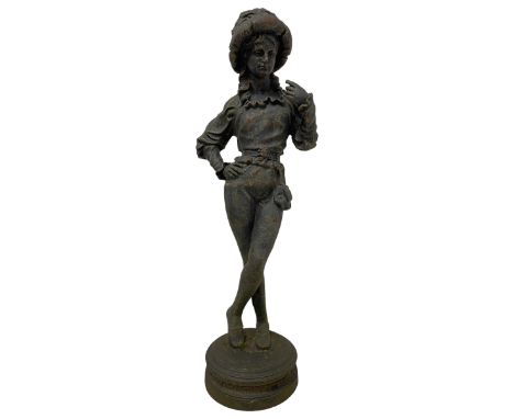 Cast metal garden statue with painted bronze finish, in the form of a young dancing girl wearing an oversized bonnet with ruf