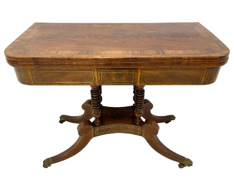 Regency brass inlaid figured mahogany card table, fold-over swivel action rectangular top with rosewood band, the frieze inla
