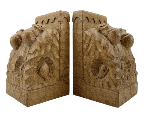 Mouseman - pair of bookends each carved with three mice, tooled decorated with penny moulded cresting rail, by the workshop o