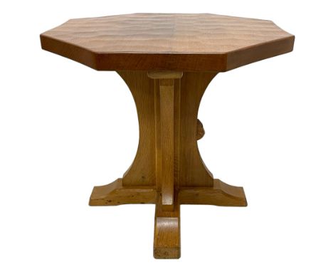 Mouseman - oak coffee table, adzed octagonal top on cruciform base and sledge feet, carved with mouse signature, by the works