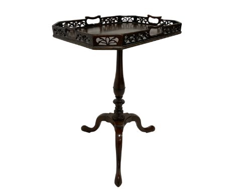 Early 20th century George III design mahogany silver table, the canted rectangular tray top pierced with handles and foliate 