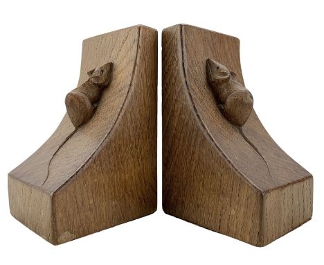 Mouseman - pair of tooled oak bookends, curved form and carved mouse signature, by the workshop of Robert Thompson, KilburnDi