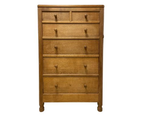 Mouseman - oak chest, raised back over adzed rectangular canted top, fitted with two short over four long graduating drawers,