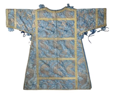 18th century French or Italian dalmatic vestment,  of blue silk damask, mainly in silver gilt and coloured threads with scrol