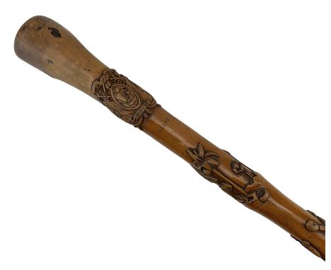 Late 19th century Ecuador carved wood walking stick inscribed 'Quito' and dated 1898, carved with figures in various pursuits