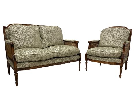 Late 20th century French design stained beech framed bergère lounge suite - two-seat sofa (W127cm, H91cm, D85cm); matching ar